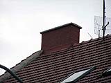 Brno Valchařská Bytový dům - Oprava komínů na střeše objektu